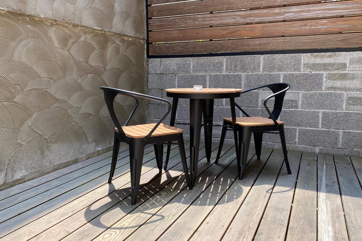 Elegant Balcony Design with a Stone Wall Elegant Balcony Design with a Stone Wall