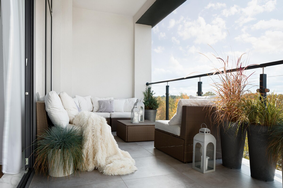 Elegant Balcony Design with White Chairs Elegant Balcony Design with White Chairs