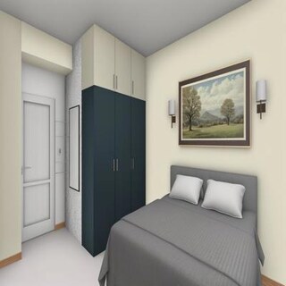 Bedroom with Dark Wardrobe and Wall Artwork
