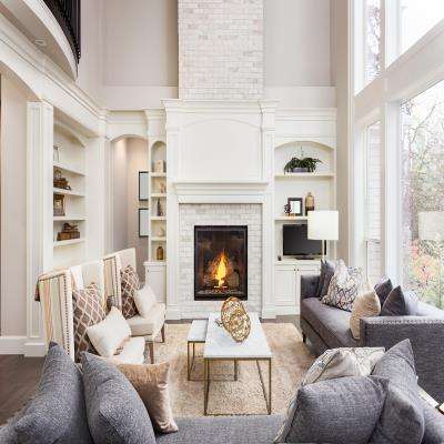 Luxurious Living Room Design With Comfortable Seating and Large Windows With Outside View