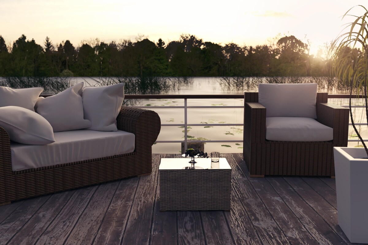 Elegant Modern Balcony Design with a Glass Coffee Table Elegant Modern Balcony Design with a Glass Coffee Table