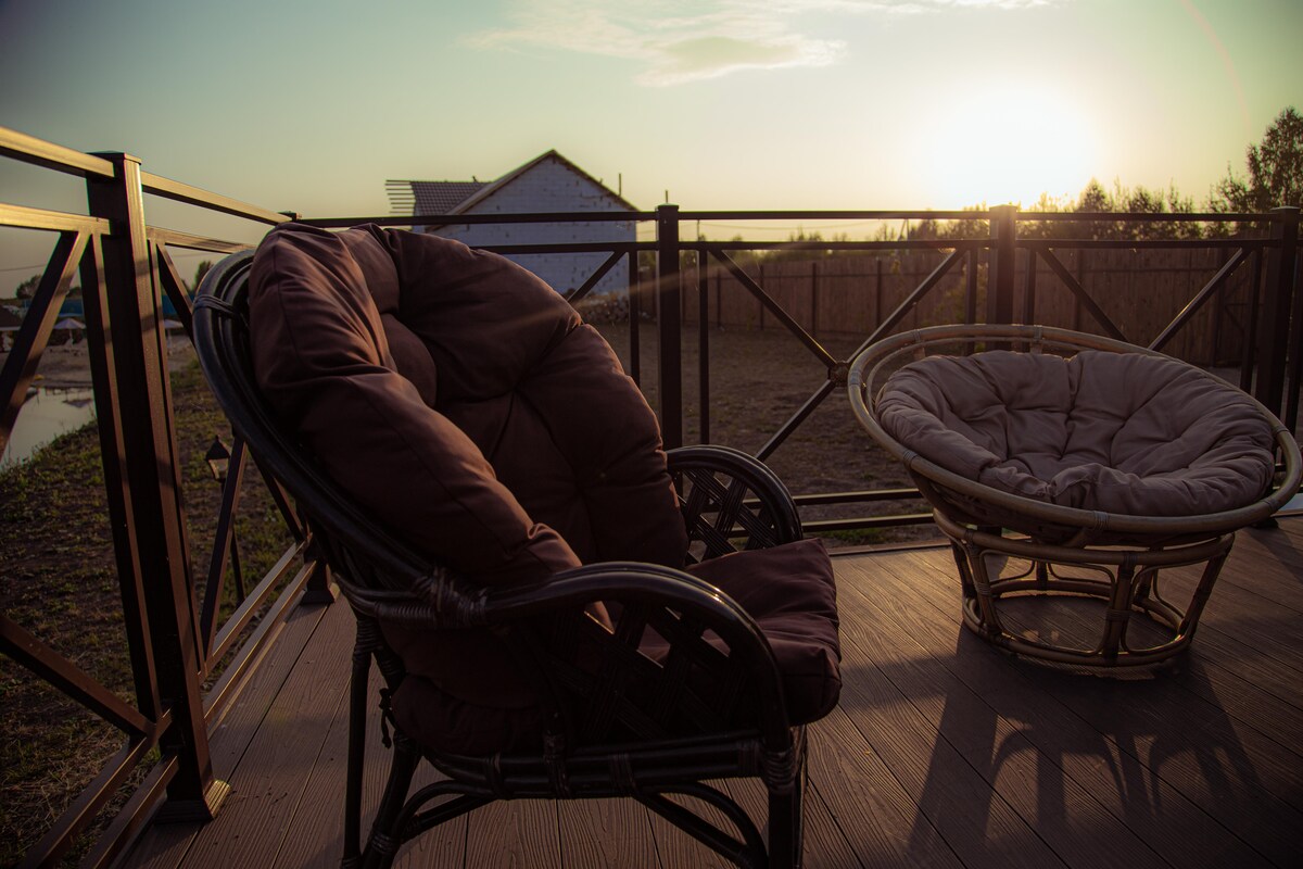 Elegant Contemporary Balcony Design with Cane Furniture