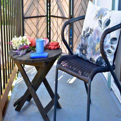 Simple Balcony Design with Rustic Chairs and Tables