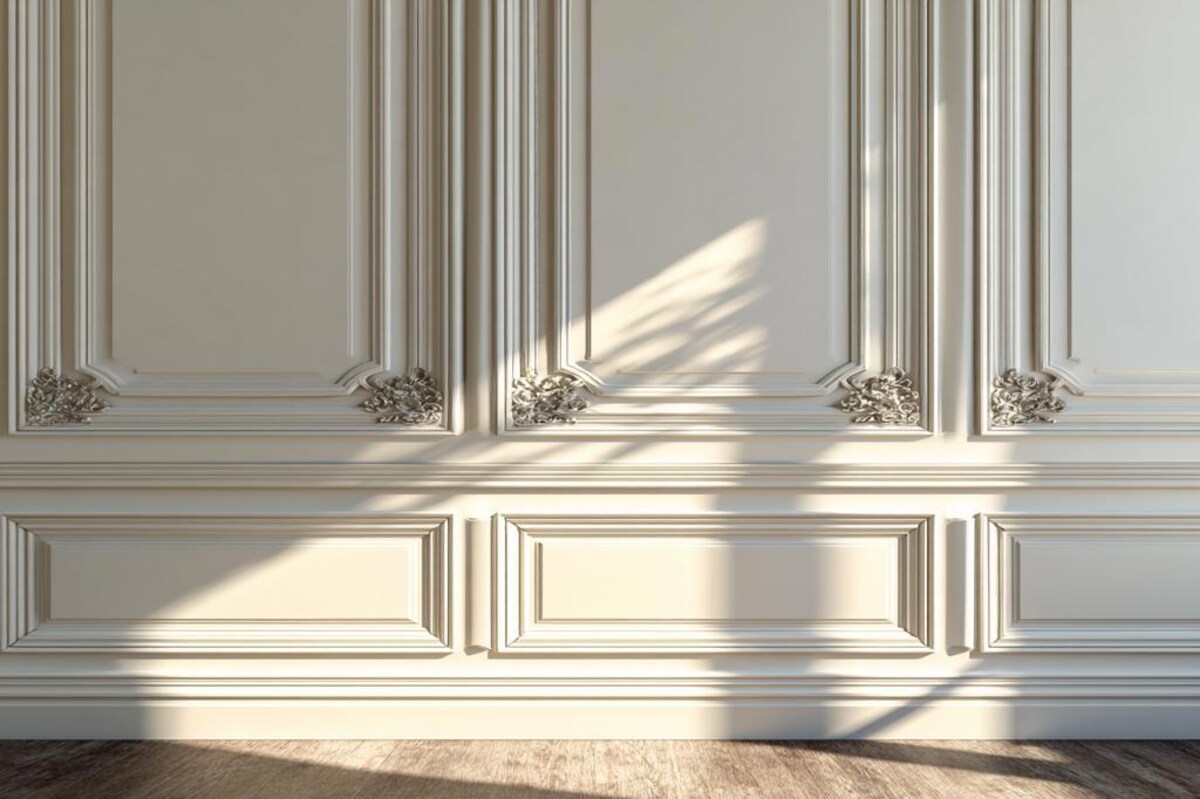 Classic White Wall Design with Molding and Paneling Details Classic White Wall Design with Molding and Paneling Details
