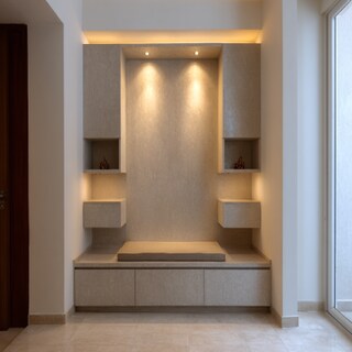 Compact Pooja Room Design With Storage Unit