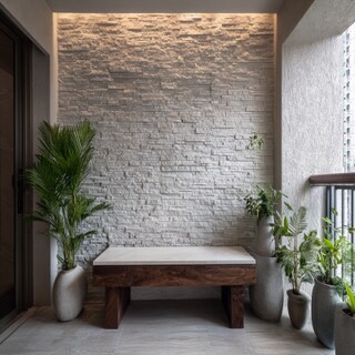 Contemporary Balcony Design with Textured Stone Cladding on the Wall
