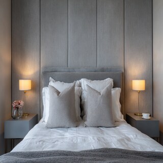 Contemporary Bedroom Design With A Double Bed And Grey Side Tables