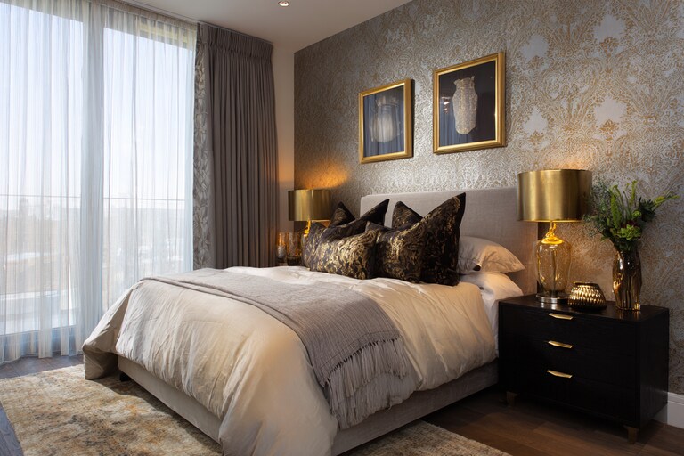 Contemporary Bedroom Design With A King Size Bed And Patterned Wallpaper