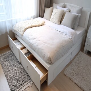 Contemporary Bedroom Design With A White Double Bed With Built-In Storage