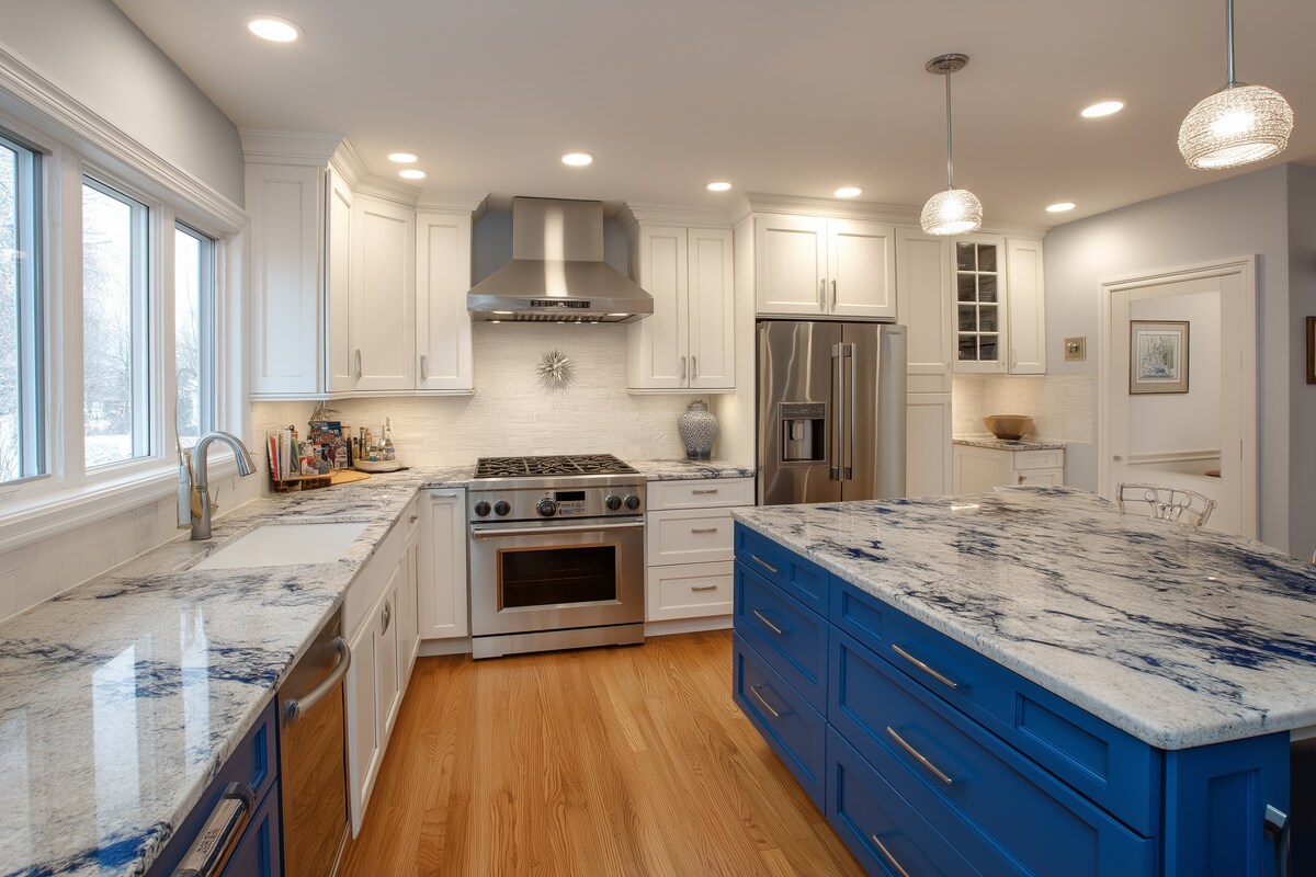 Contemporary L-Shaped Kitchen Design with Blue and White Cabinets and Granite Countertop