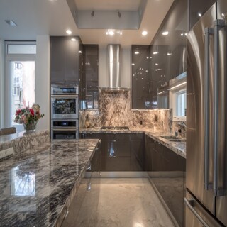 Contemporary L-Shaped Kitchen Design with Glossy Cabinets and Granite Countertop