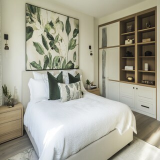 Contemporary Master Bedroom Design with Botanical Art and Built-In Storage