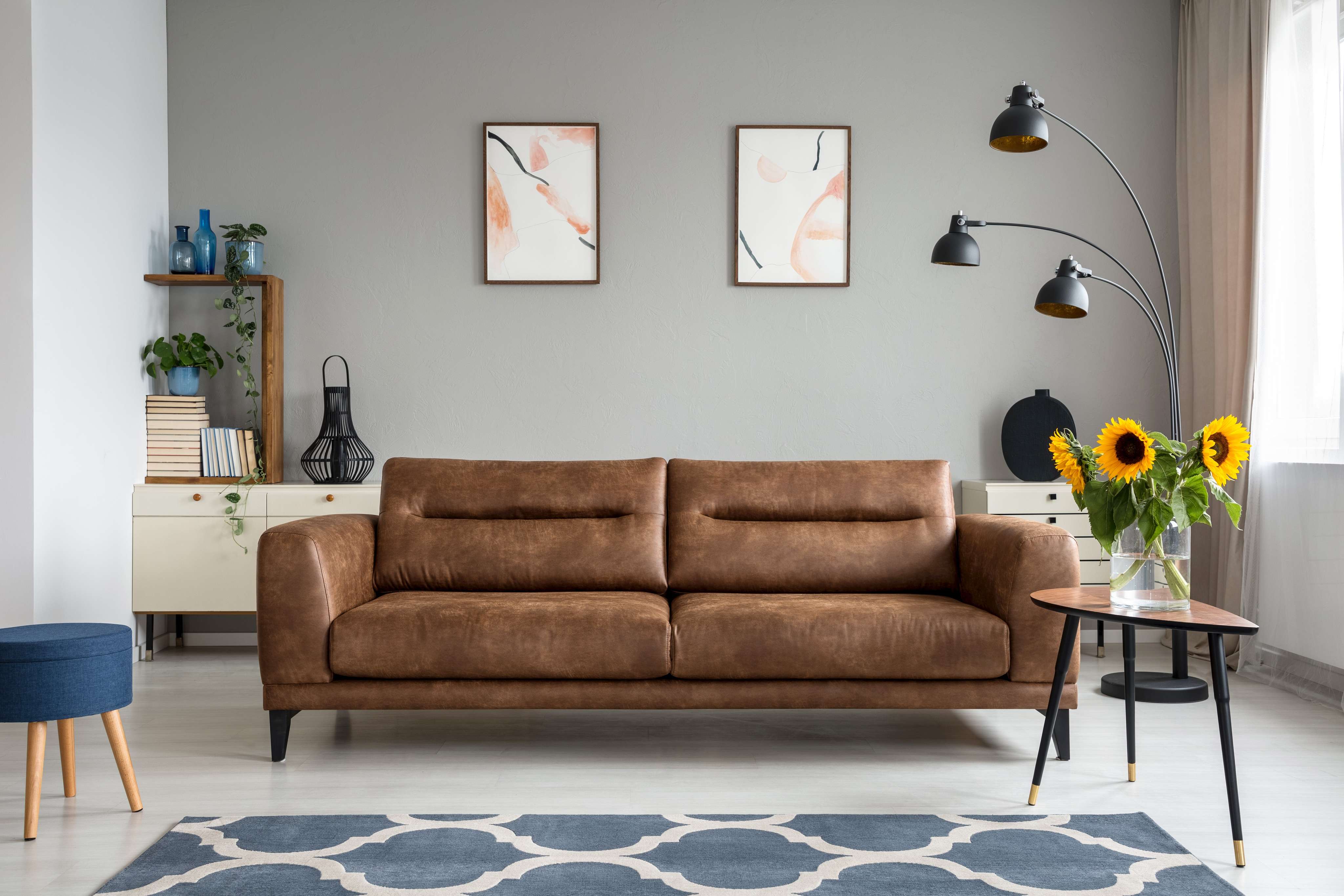 Simple Living Room Interior Design featuring a Brown Leather Sofa