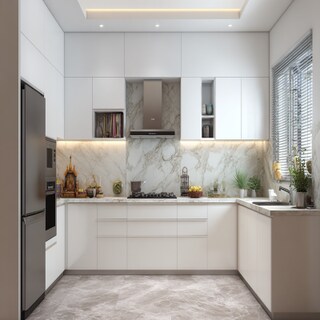 Minimal L-Shaped Kitchen Design With Pooja Unit and Marble Backsplash