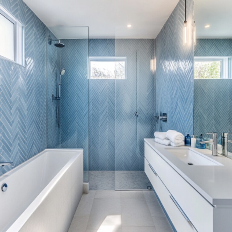 Modern Bathroom Design With Blue Herringbone Tiles and Floating Vanity