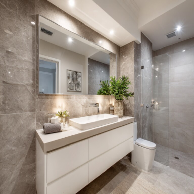 Modern Bathroom Design With Light Grey Tiles And Rectangular Mirror