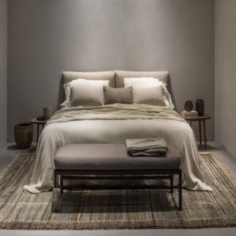 Modern Bedroom Design With A Double Bed And An Ottoman Bench
