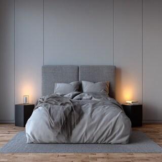 Modern Bedroom Design With A King Size Bed And A Grey Tufted Headboard