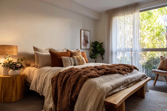 Modern Bedroom Design With A King Size Bed And Wooden Side Table