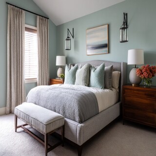 Modern Master Bedroom Design With Grey Upholstered Bed And Mint Green Walls