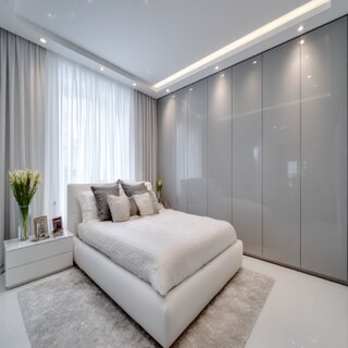 Modern Master Bedroom Design with King Bed and Glossy Floor-to-Ceiling Wardrobe