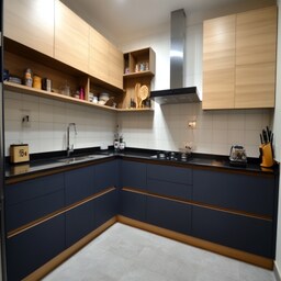 Contemporary Parallel Kitchen Design With Walnut Finish and Glass Cabinets