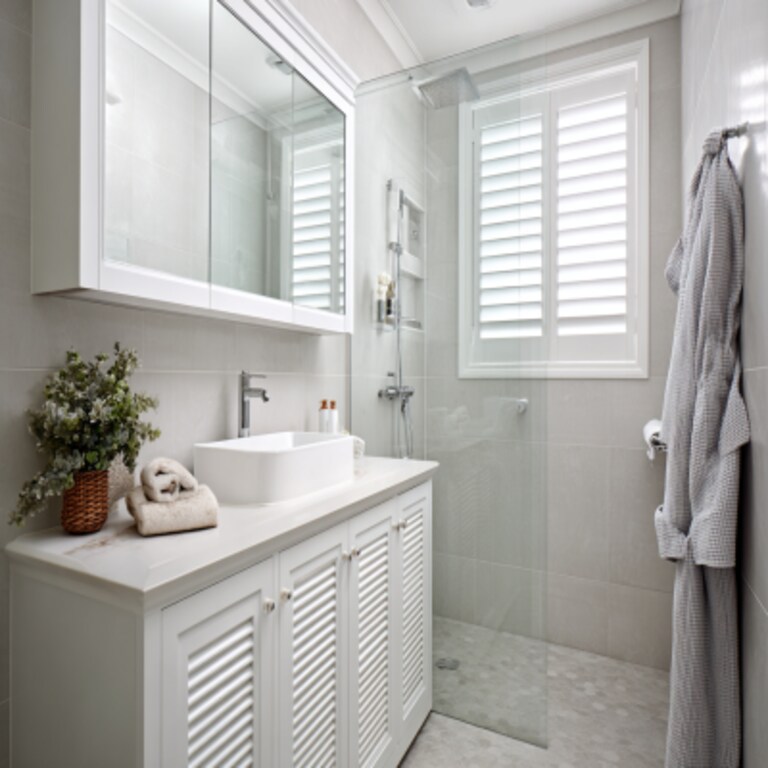 Modern White Bathroom Design With Shutter Cabinet