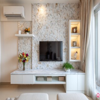 Modern White TV Unit With A Patterned Wallpaper For The Back Wall