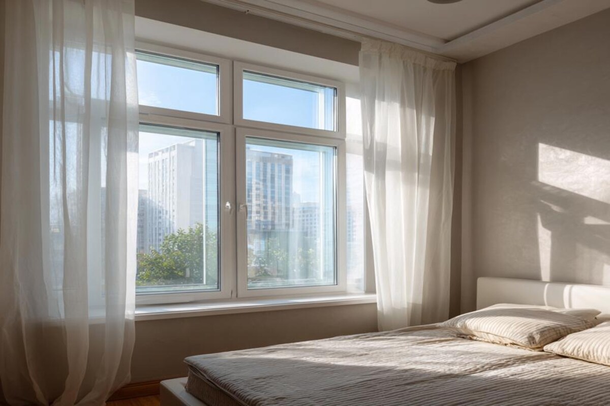 Modern White Window Design With Two Tier Glass Shutters