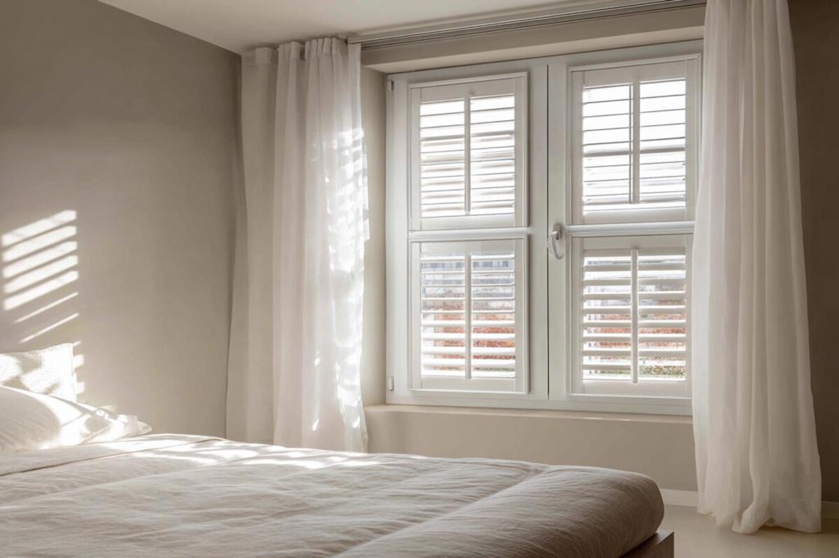 Modern White Window Design With Two Tier Shutters