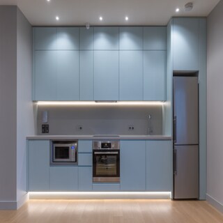 Natural Blue and Grey Wall Colour Combination for Kitchen with Flat Panels and Steel Appliances