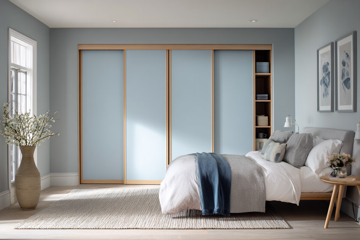 Scandinavian 3-Door Sliding Wardrobe Design in Shades of Blue Scandinavian 3-Door Sliding Wardrobe Design in Shades of Blue