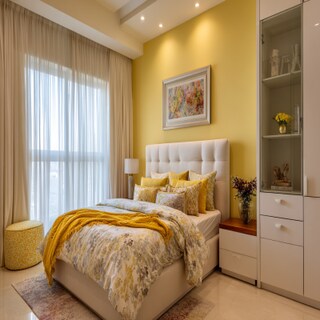 Sophisticated Yellow and White Wall Colour Combination for Bedroom with Accent Headboard and Glass Wardrobe